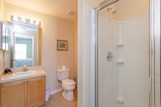 bathroom featuring a shower with door, tile patterned floors, and toilet