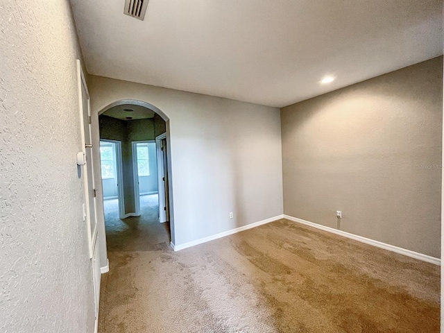 view of carpeted spare room