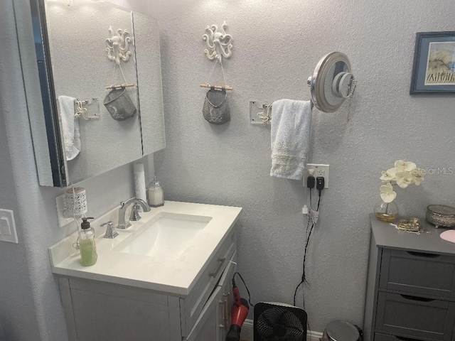 bathroom featuring large vanity