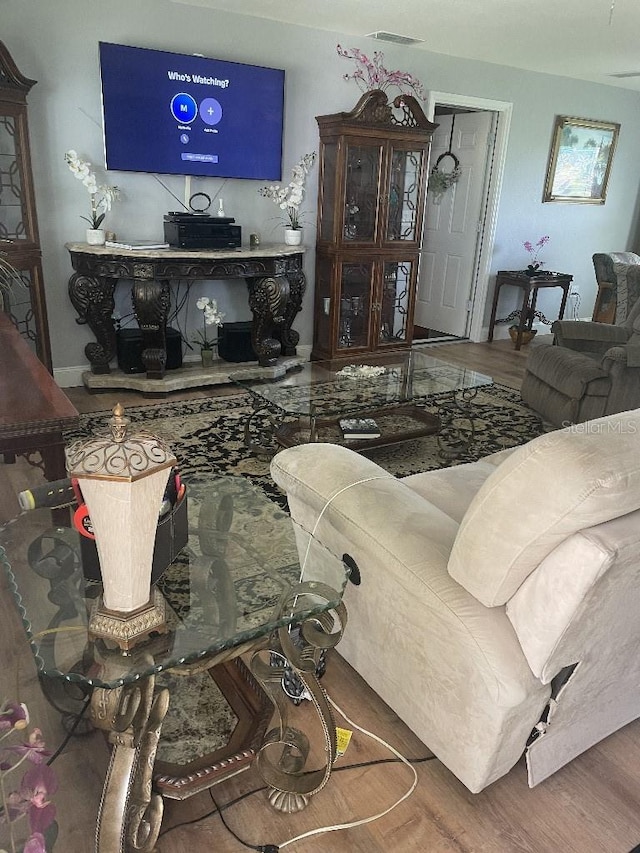 living room with wood-type flooring