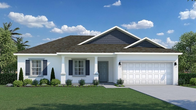 view of front of property featuring a garage and a front yard