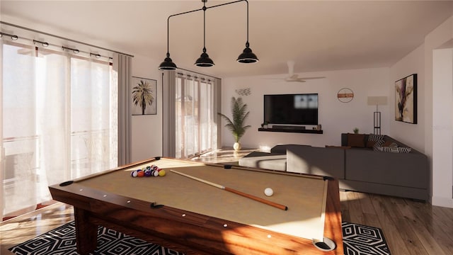 playroom featuring billiards, ceiling fan, and dark hardwood / wood-style flooring