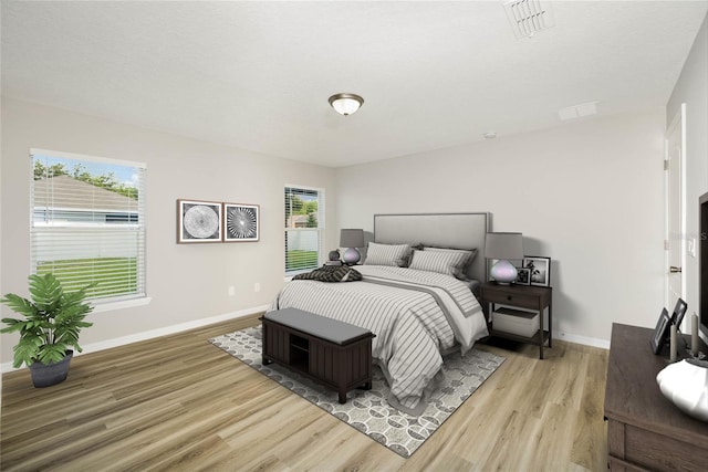 bedroom featuring light hardwood / wood-style flooring