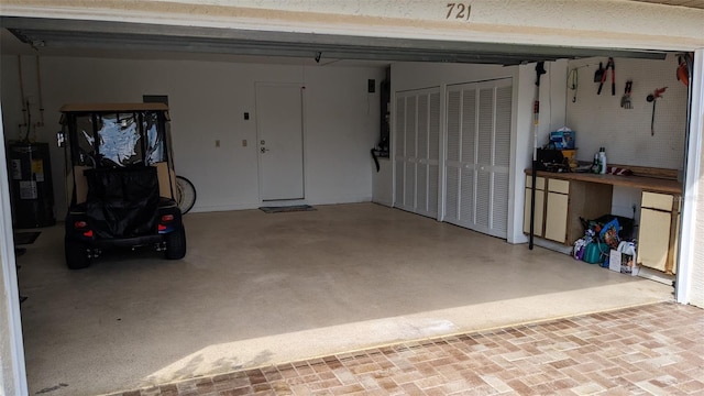 garage featuring water heater