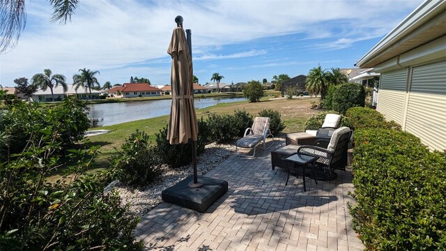 view of patio / terrace with a water view