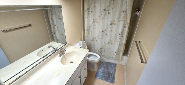 full bathroom with shower / bath combo, vanity, and toilet