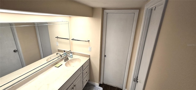 bathroom featuring vanity with extensive cabinet space