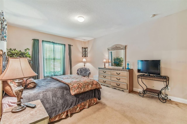 bedroom with light carpet