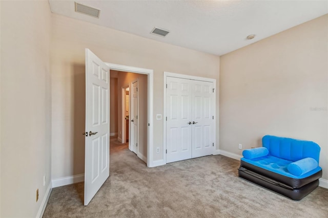 unfurnished room with carpet floors