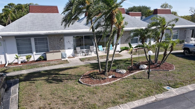 view of front of home with a front yard