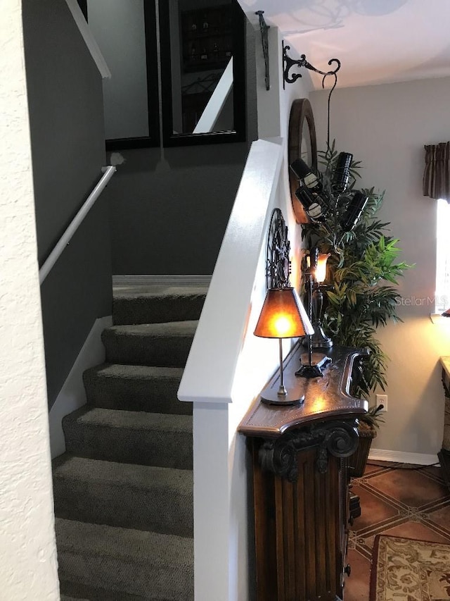 stairway with tile flooring