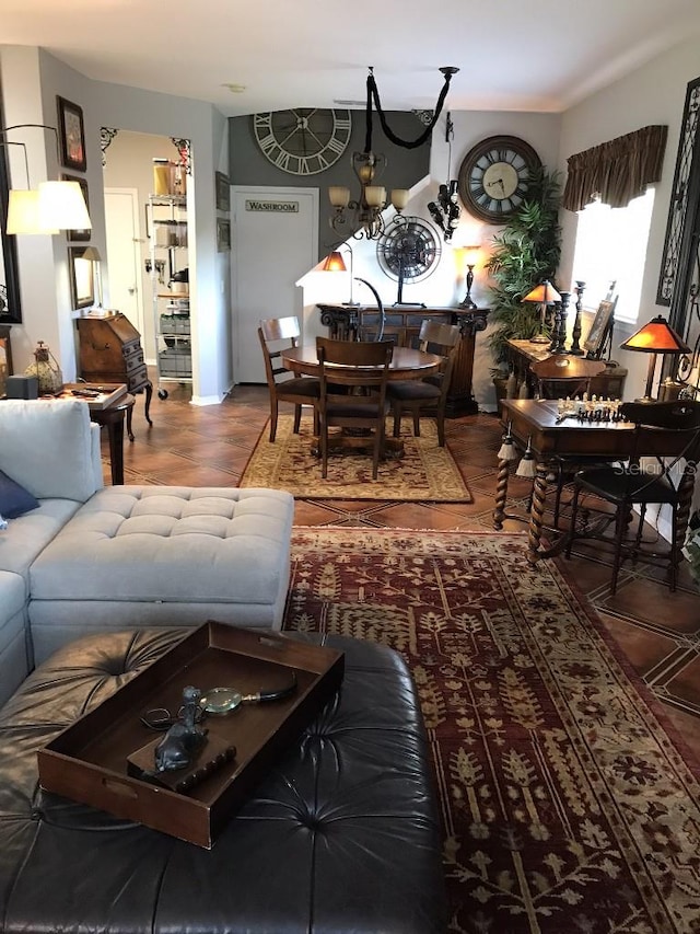 living room with an inviting chandelier