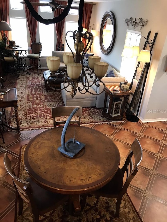 dining area with tile floors and a wealth of natural light