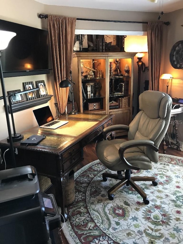 office space featuring dark wood-type flooring