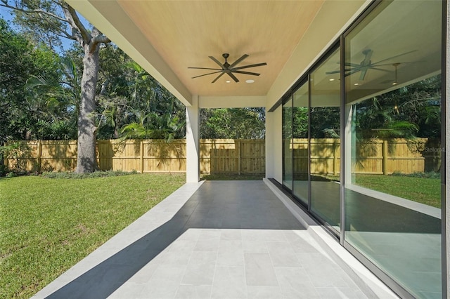 view of patio / terrace featuring ceiling fan