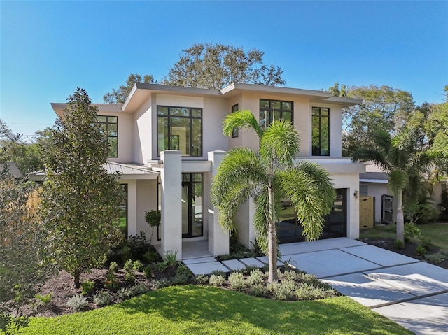 contemporary house featuring a garage