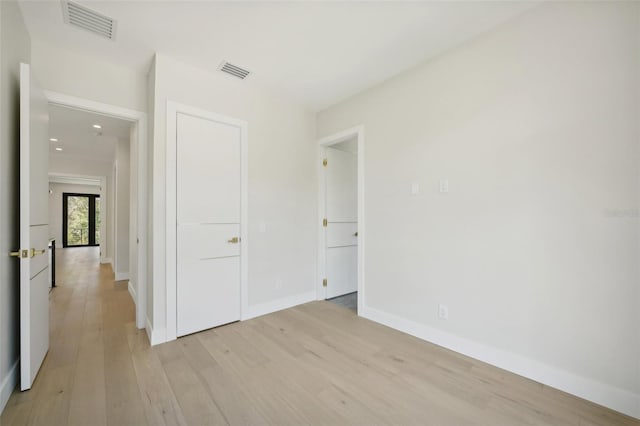 unfurnished bedroom with light hardwood / wood-style floors