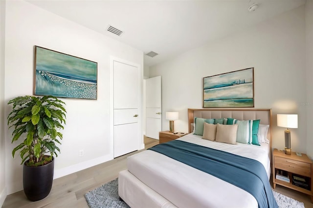 bedroom featuring light wood-type flooring