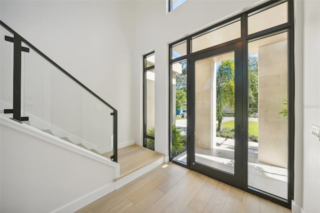 entryway with light hardwood / wood-style floors