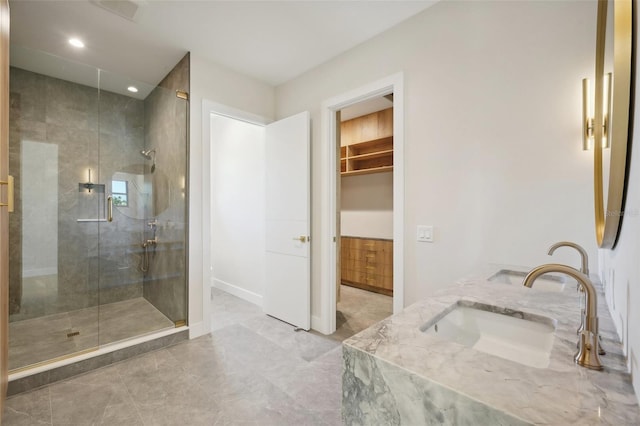 bathroom with vanity and an enclosed shower