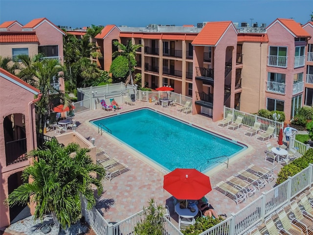 view of swimming pool featuring a patio area