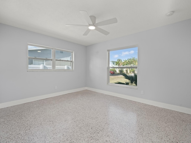 empty room featuring ceiling fan