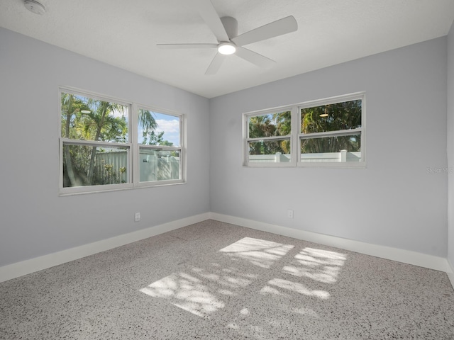 spare room featuring ceiling fan