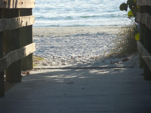 exterior details with a view of the beach and a water view