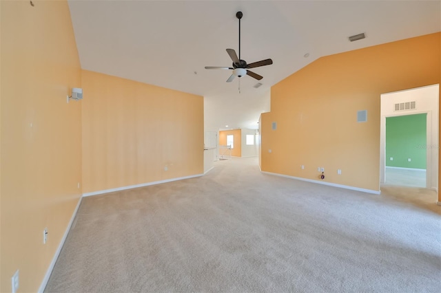 carpeted empty room with lofted ceiling and ceiling fan