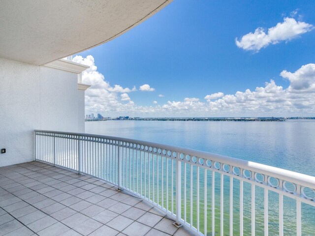 balcony featuring a water view