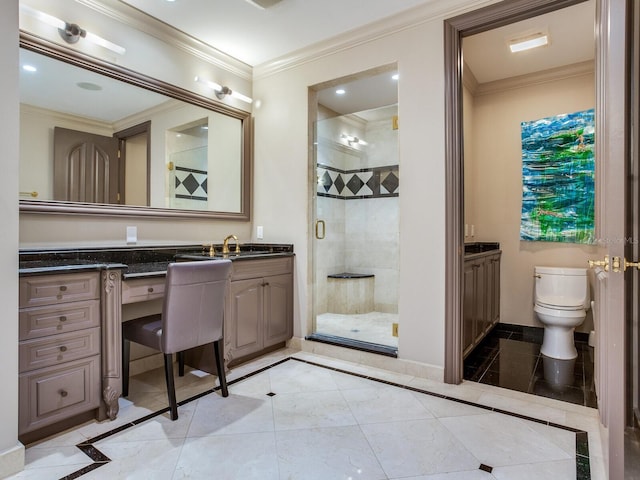 bathroom featuring crown molding, toilet, a stall shower, vanity, and baseboards