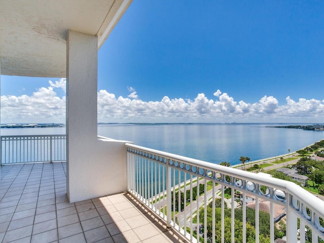 balcony featuring a water view