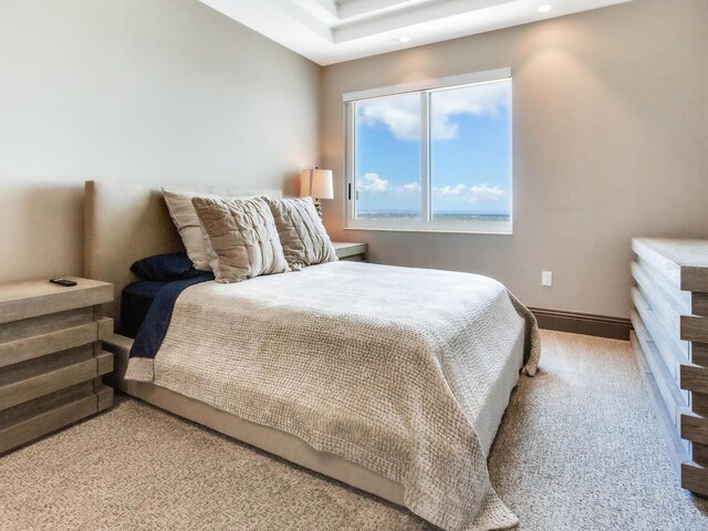 carpeted bedroom with baseboards