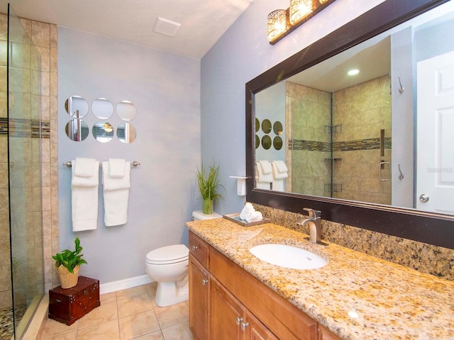 bathroom featuring toilet, tile flooring, an enclosed shower, and oversized vanity