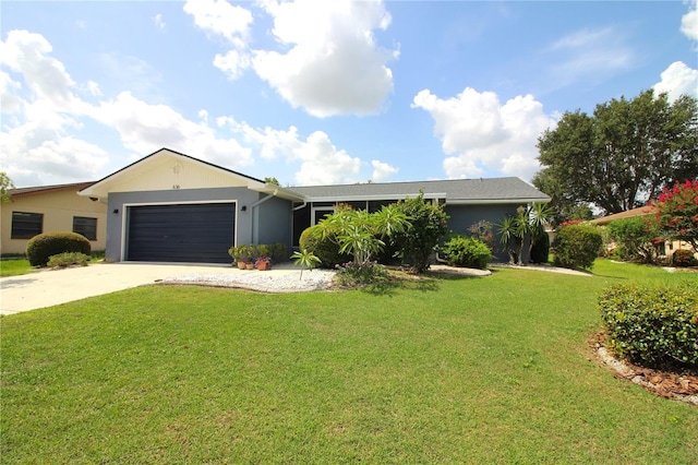 single story home with a front lawn and a garage