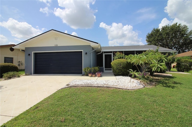 single story home with a front yard and a garage