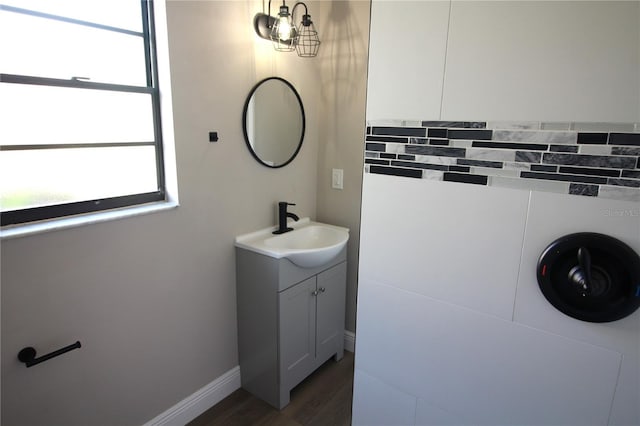 bathroom with vanity and hardwood / wood-style flooring