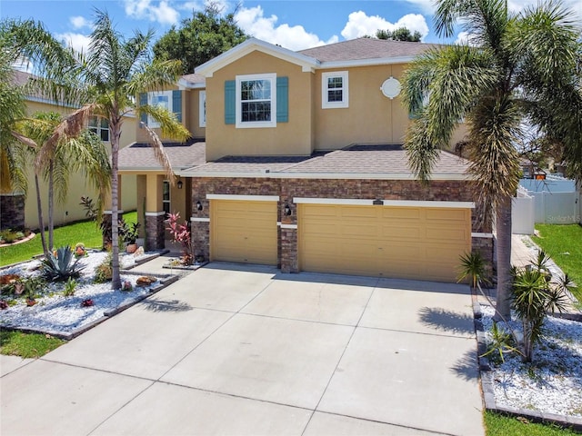 view of front of property featuring a garage