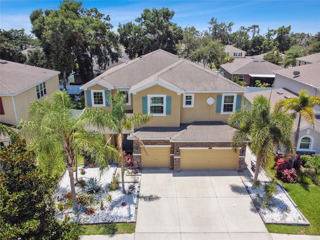 view of front of property with a garage