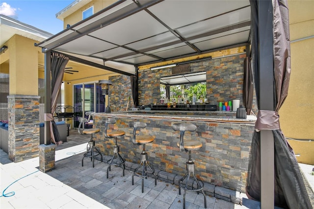 view of patio / terrace featuring a bar