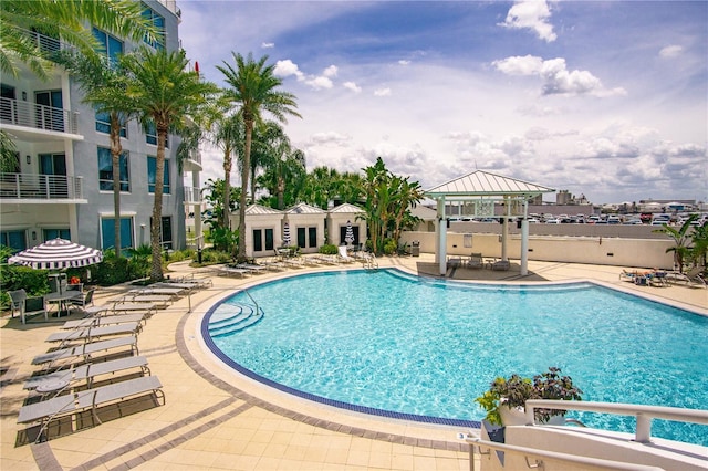 view of swimming pool featuring a gazebo and a patio