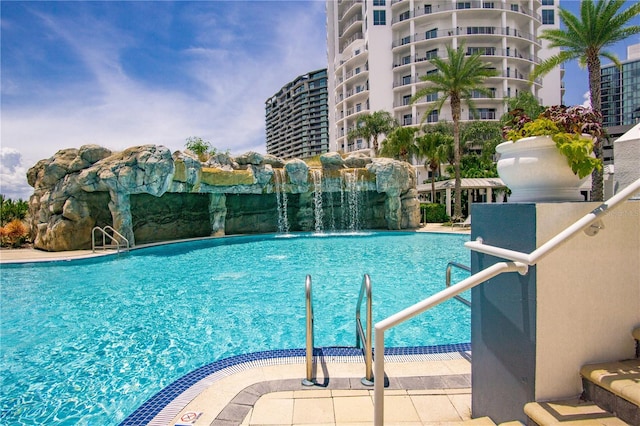 view of pool featuring pool water feature