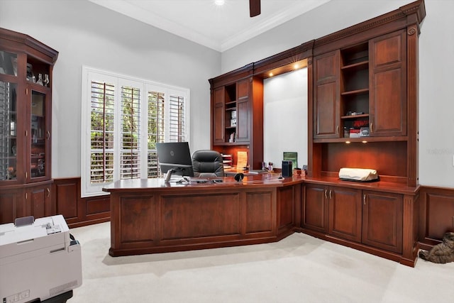 office featuring crown molding, light carpet, and ceiling fan