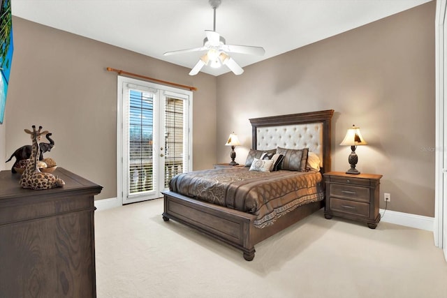 bedroom with light colored carpet, access to exterior, ceiling fan, and french doors