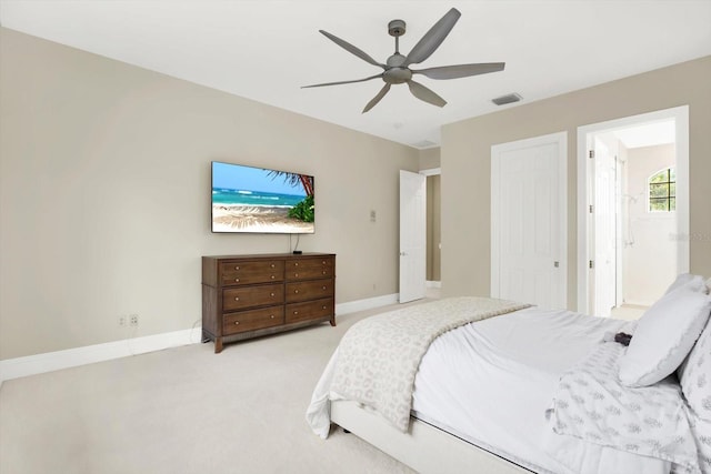 bedroom with light carpet and ceiling fan