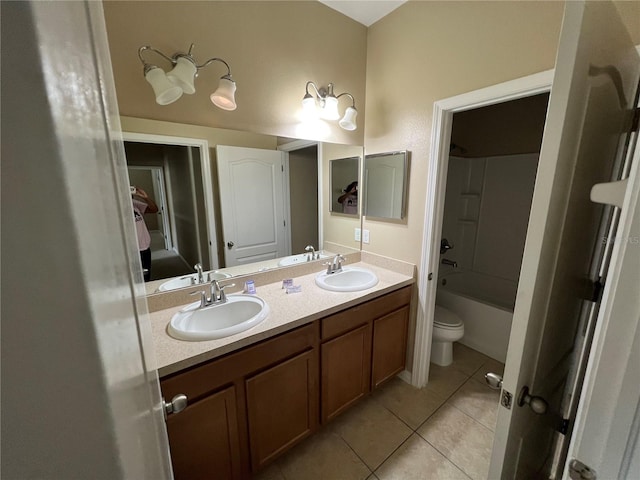 full bathroom featuring toilet, tile patterned flooring, shower / bathing tub combination, and vanity