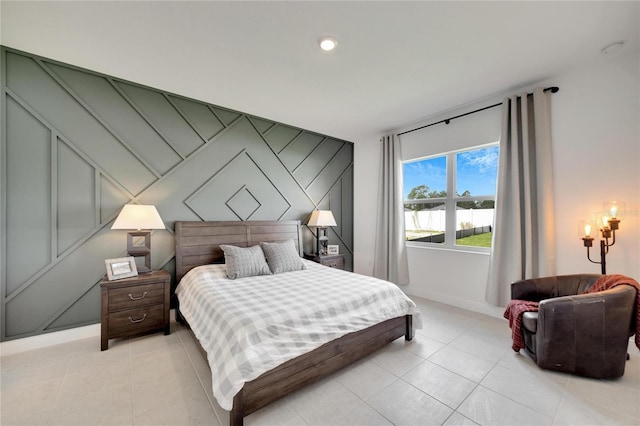 bedroom with light tile floors