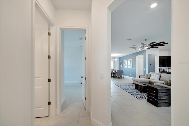 hallway with light tile floors