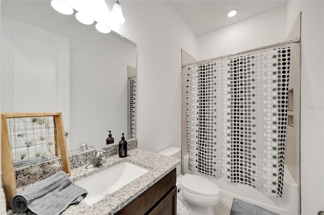 full bathroom with shower / tub combo with curtain, vanity, and toilet