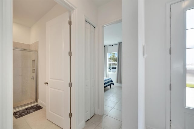 hallway with light tile floors